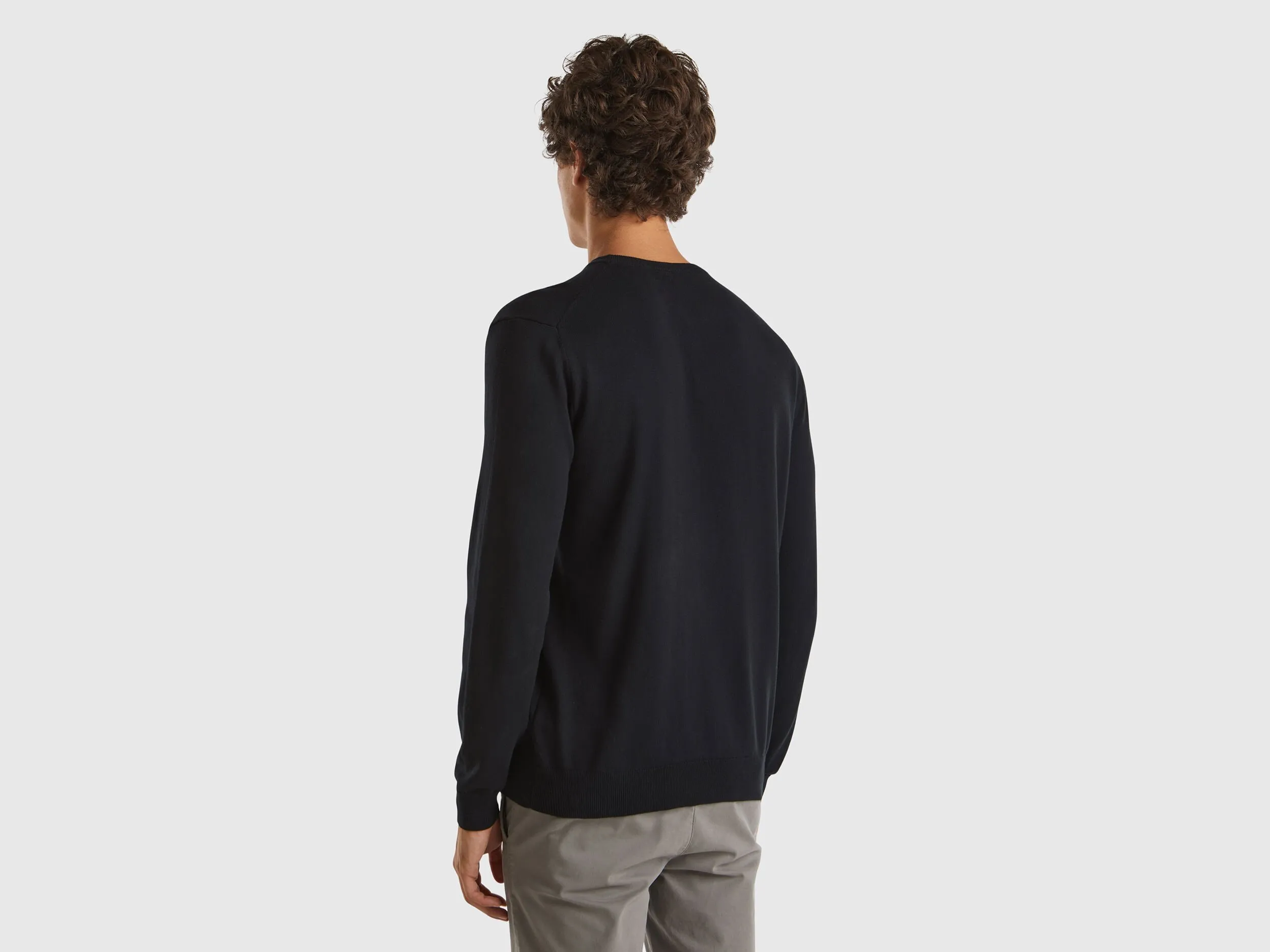 Crew neck sweater in 100% cotton - Black | Benetton